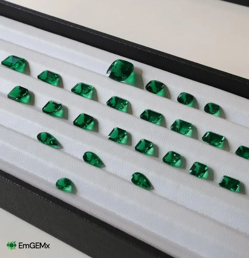Organized emerald collection in display tray