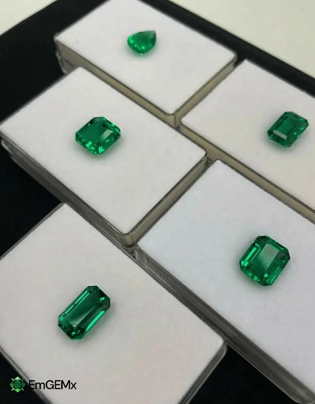 Individual emeralds in presentation boxes